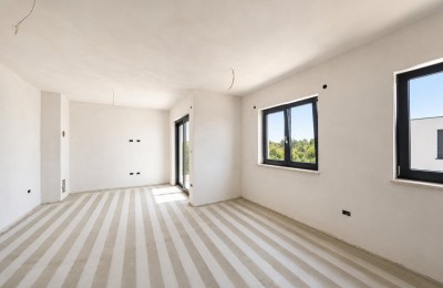 Stan sa dvije spavaće sobe, na prvome katu moderne novogradnje - u izgradnji